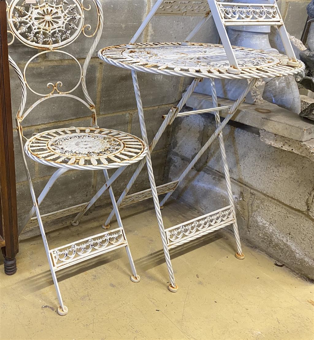 A folding painted aluminium garden table, width 70cm, depth 52cm, height 74cm and two matching chairs